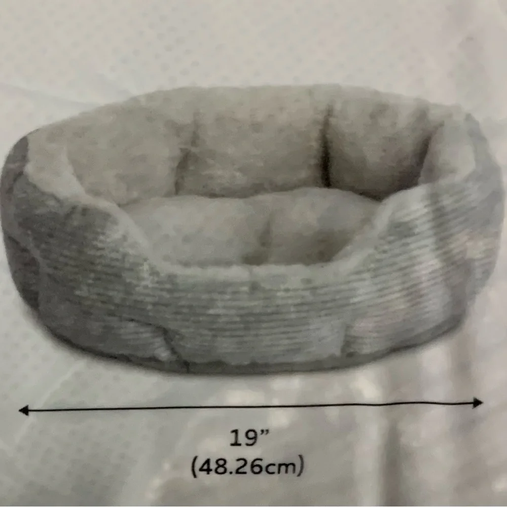 Brand new small (up to 20 pounds) cat or dog 19” round cuddler pet bed